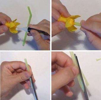 For at lave frynser skal du lave små snit i kernen af ​​blomsten, når du fjerner den fra tuschpen. Drej hvert hak udad for at simulere kernen i en ægte påskelilje.