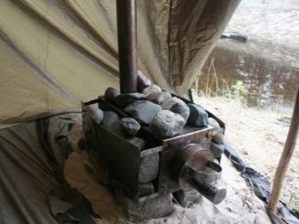 موقد الخيمة: نظرة عامة على مواقد التخييم طويلة الأمد ، والنماذج المصغرة من الخشب والغاز لتدفئة خيمة سياحية شتوية