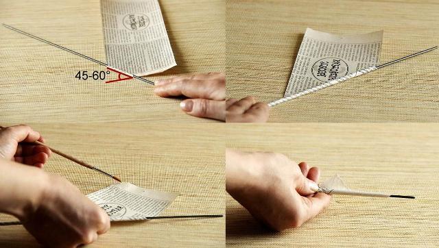 Begynd at sno avisstrimler på et spyd, og så røret ikke folder sig ud, smør spidsen med lim