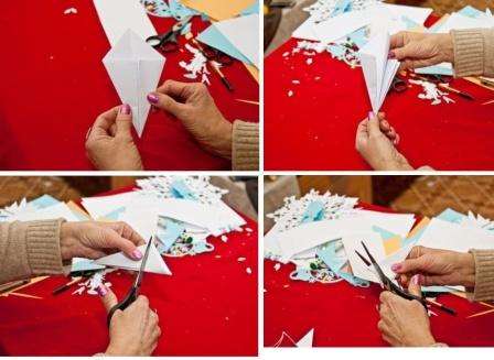 Aby ste to urobili, budete musieť vybrať vhodný vzor, ​​preniesť ho na skladaný papier a vystrihnúť. Aby snehová vločka vyzerala úhľadne, po rozložení ju umiestnite pod lis, aby sa papier vyrovnal.